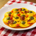 RAVIOLI DI MOZZARELLA AL PESTO E POMODORO