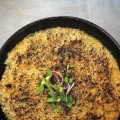 Arroz cremoso de siri, gratinado